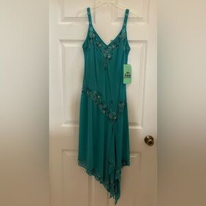 Embellished sleeveless dress asymmetrical hem